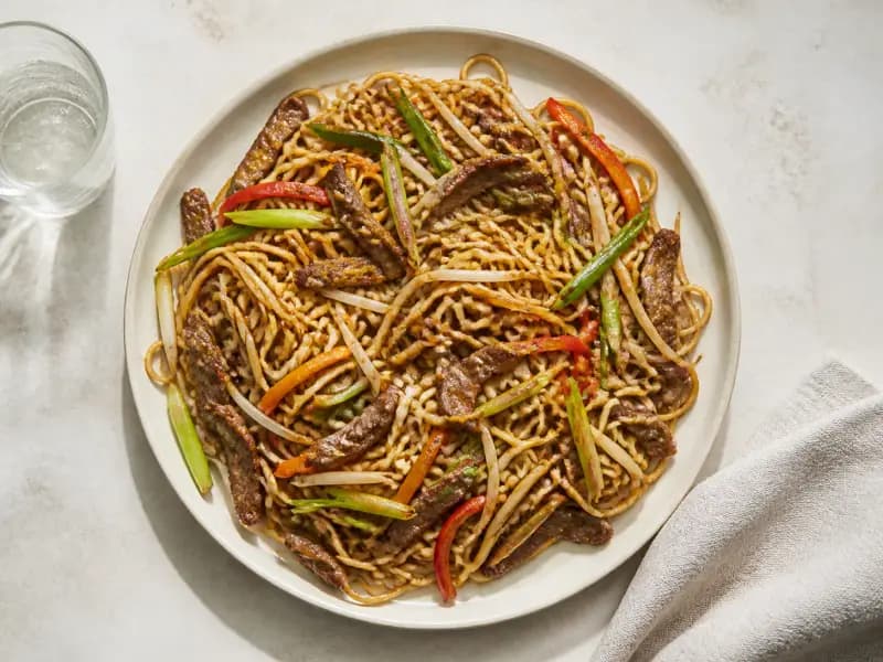 Beef Chow Mein — shot from directly overhead: beef coated in cornflour and seared in batches in a pan hot enough to smoke