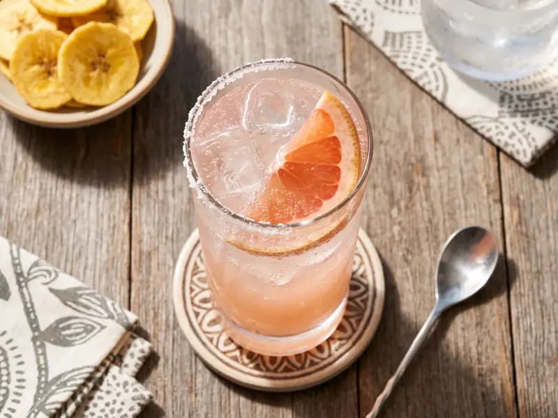 Paloma — shot from directly overhead, the table surface filling the frame