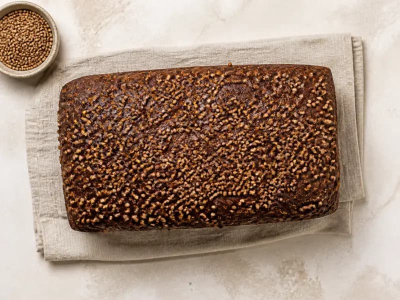 Borodinsky Rye Bread — shot from directly overhead: dark sourdough rye scalded with red rye malt
