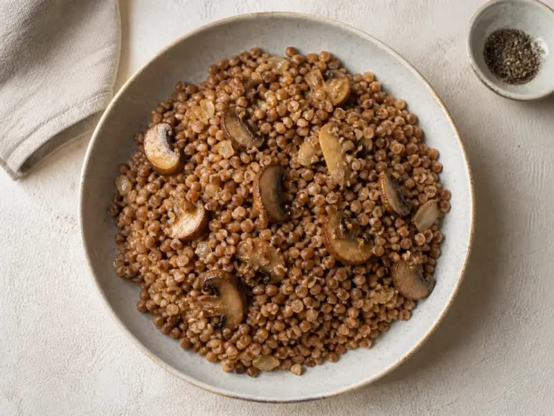 Buckwheat Kasha with Mushrooms — shot from directly overhead: buckwheat toasted dry