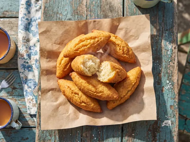 Festival — shot from directly overhead: slightly sweet cornmeal dumplings rolled long