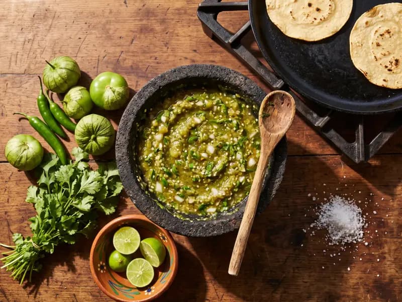 Salsa Verde — shot from directly overhead: tomatillos and green chilli blitzed with coriander and lime — sharp