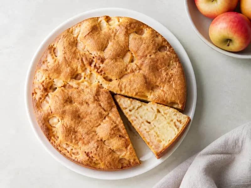 Sharlotka — shot from directly overhead: apple sponge with far more fruit than batter