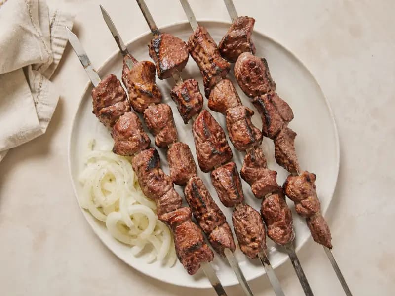 Shashlik — shot from directly overhead: cubed lamb marinated in grated onion and vinegar